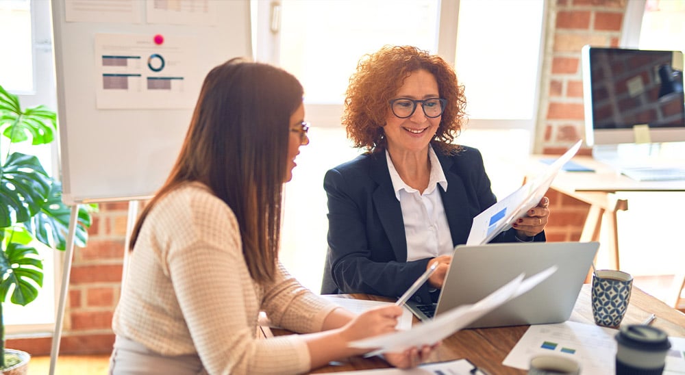 Two women working