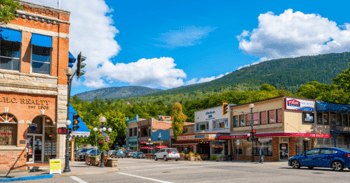 a photo of a charming main street in a small town, taken in Nelson, British Columbia