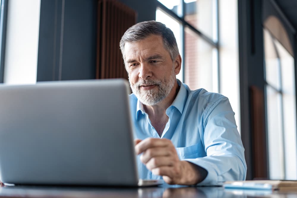 male on computer